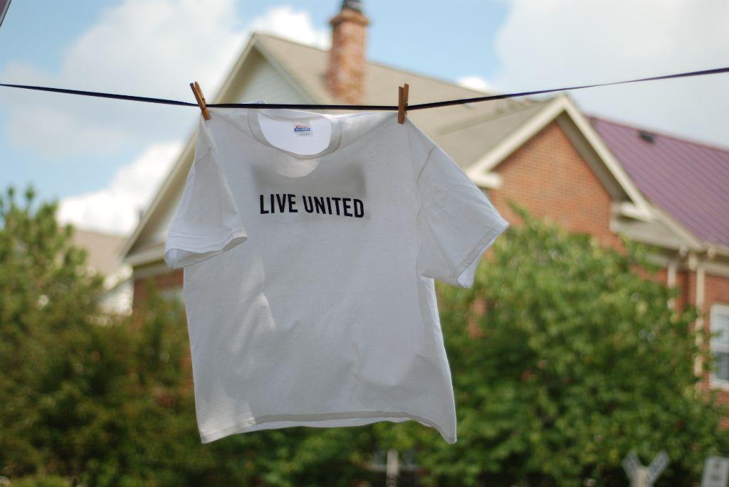 Live United T-Shirt on clothes line